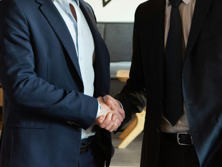 Business partners shaking hands