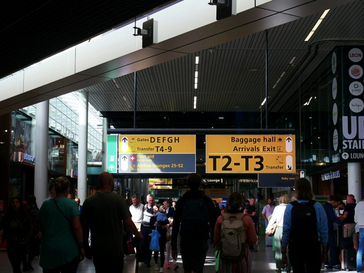 Airport terminal, travellers