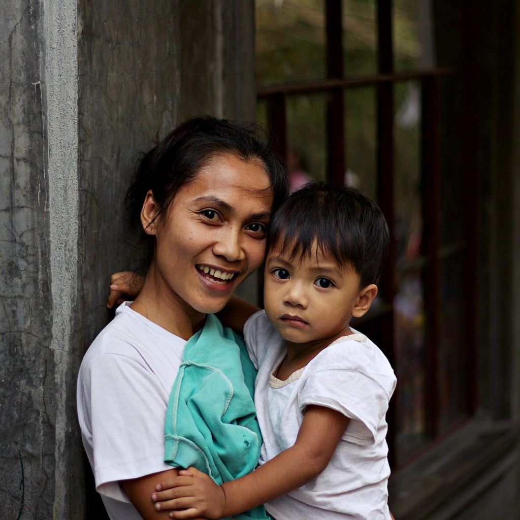 A Filipino mother and her child – the family behind every deployment.