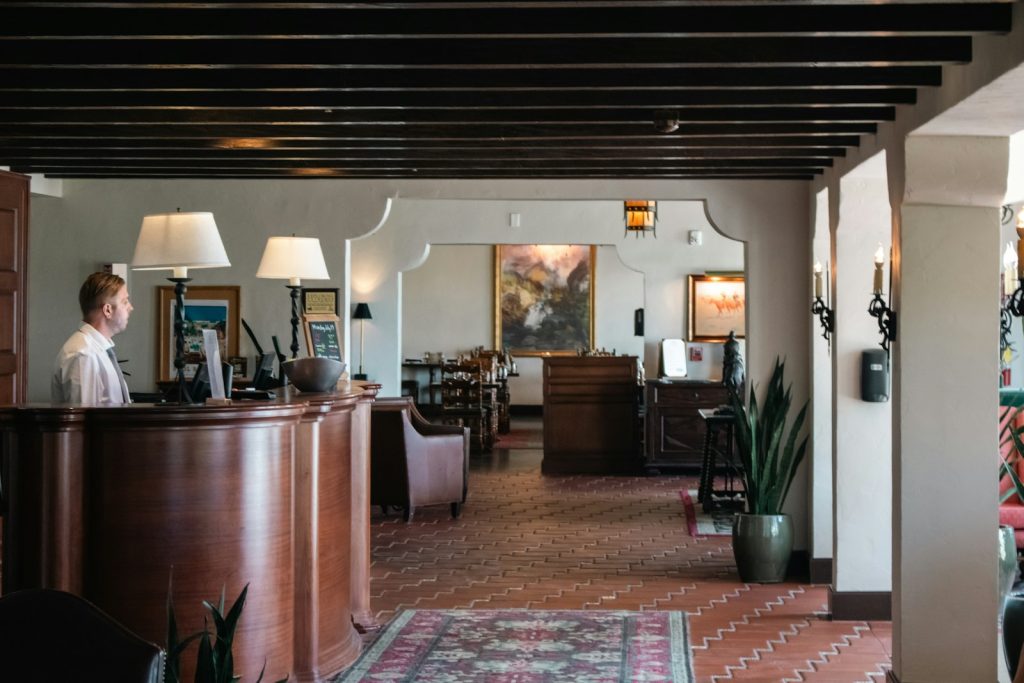 Hotel reception desk with staff